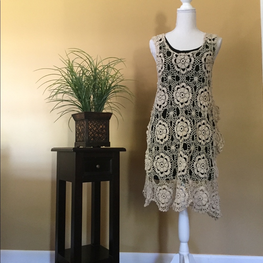 Knit beach cover up.